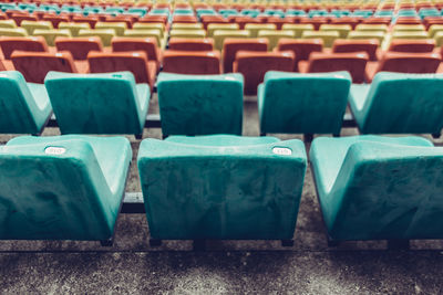 High angle view of colorful chairs at stadium