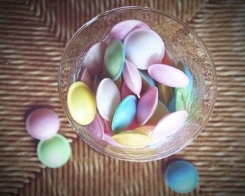 Close-up of colorful candies in bowl on table