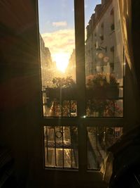 Close-up of window at sunset