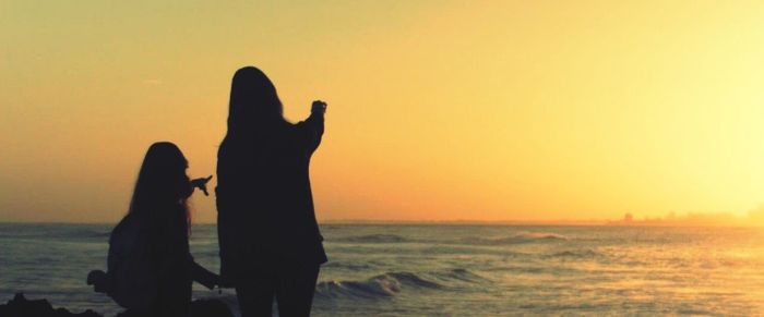 Scenic view of sea at sunset