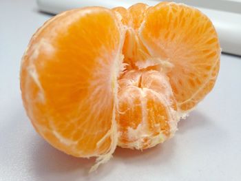 Close-up of orange fruit on table