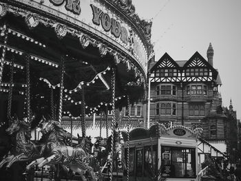 Low angle view of carousel at amusement park