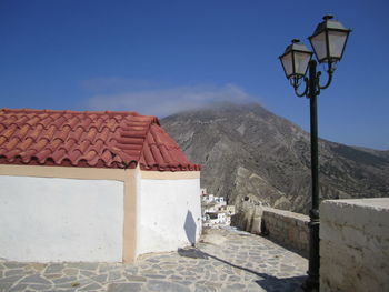 High angle view of town against cloudy sky