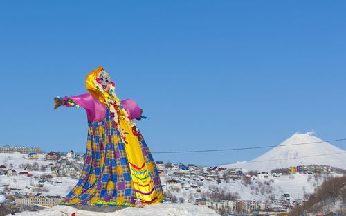 Off winter. shrovetide in kamchatka, russia. big doll for burning