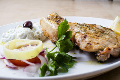 Close-up of burger in plate on table