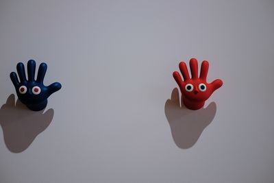 Close-up of a stuffed toy over white background