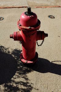 Close-up of fire hydrant on sidewalk