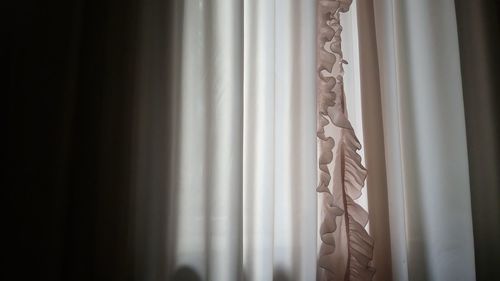 Close-up of curtain against window