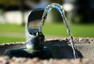 Close-up of water flowing from drinking fountain