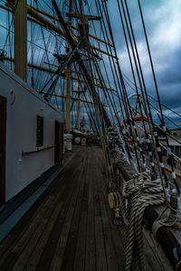 Sailboat on pier against sky