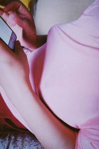 High angle view of woman using mobile phone