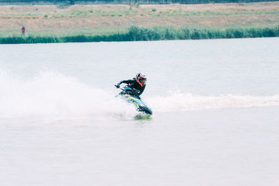 Man surfing in sea