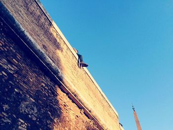 Low angle view of building against clear sky