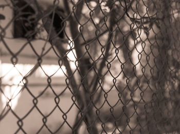 Full frame shot of chainlink fence against sky