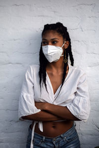 Young black woman in face mask