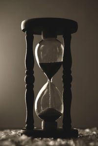 Close-up of illuminated light bulb on table