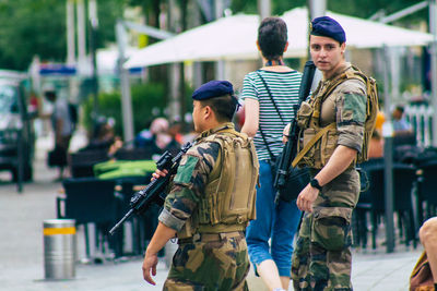 Young couple standing in city