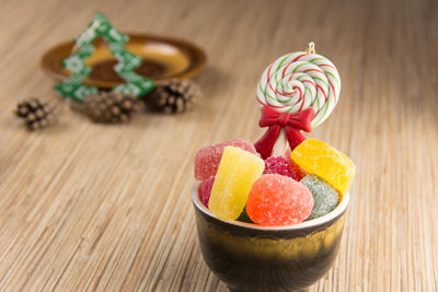 Close-up of multi colored candies on table