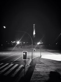 Illuminated street lights at night