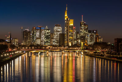 Illuminated city lit up at night