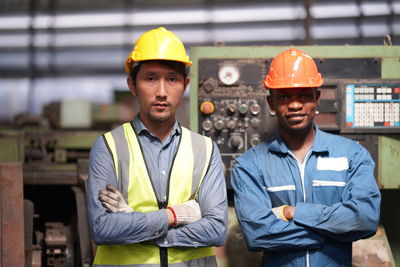 Portrait of man working at construction site