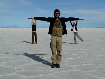 Full length of young woman jumping