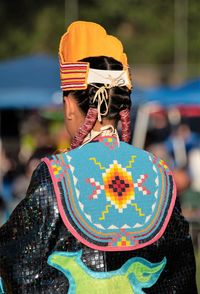 Rear view of woman wearing multi colored hat