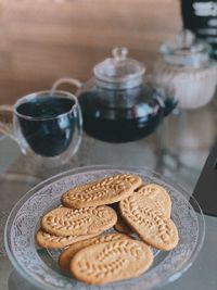 High angle view of cookies and coffee on table