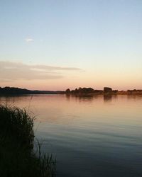 Reflection of clouds in water at sunset