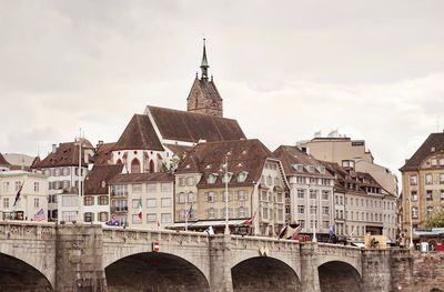 Buildings in city against sky