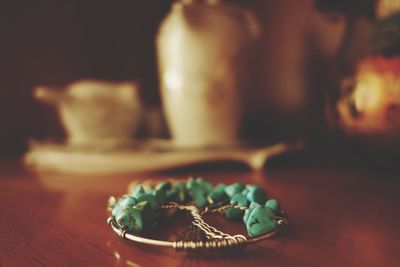 Close-up of jewelry on table