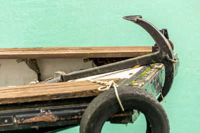 High angle view of wheel by sea