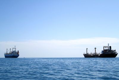 Ship in sea against sky