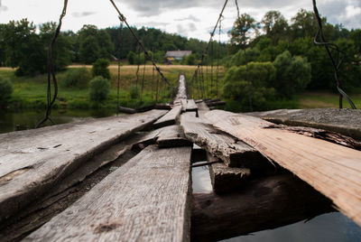 Scary bridge, it is made from random planks and just two hanging cables.