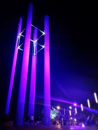 Low angle view of illuminated building at night