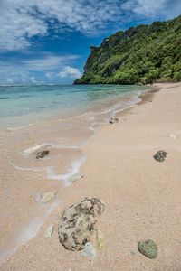 Scenic view of beach against sky