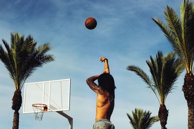 Low angle view of basketball hoop against sky