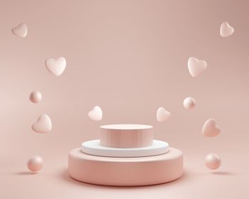 3d podium display background. pink with levitating hearts. beauty cosmetic product presentation. 