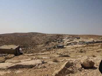 Scenic view of desert against clear sky