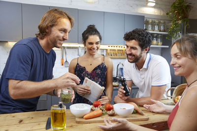 Friends toasting drinks at restaurant