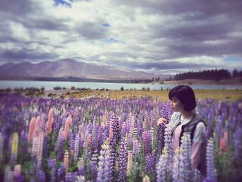 Scenic view of landscape against cloudy sky