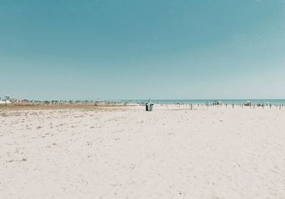 Scenic view of beach against clear sky