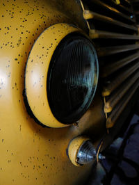 Close up of yellow machine