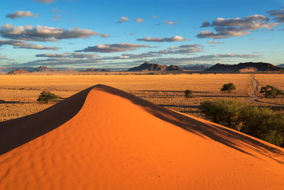 Scenic view of desert against sky