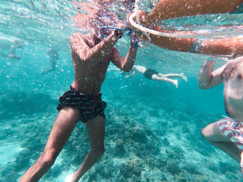 Man swimming in sea