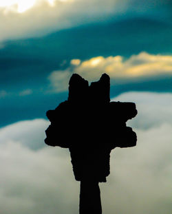 Low angle view of cloudy sky at dusk