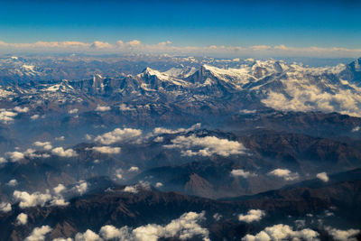 Scenic view of mountains against sky at night