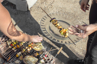 High angle view of man preparing food