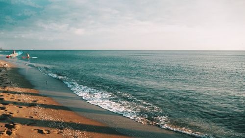 Scenic view of beach against sky