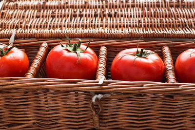 Close-up of tomatoes in basket
